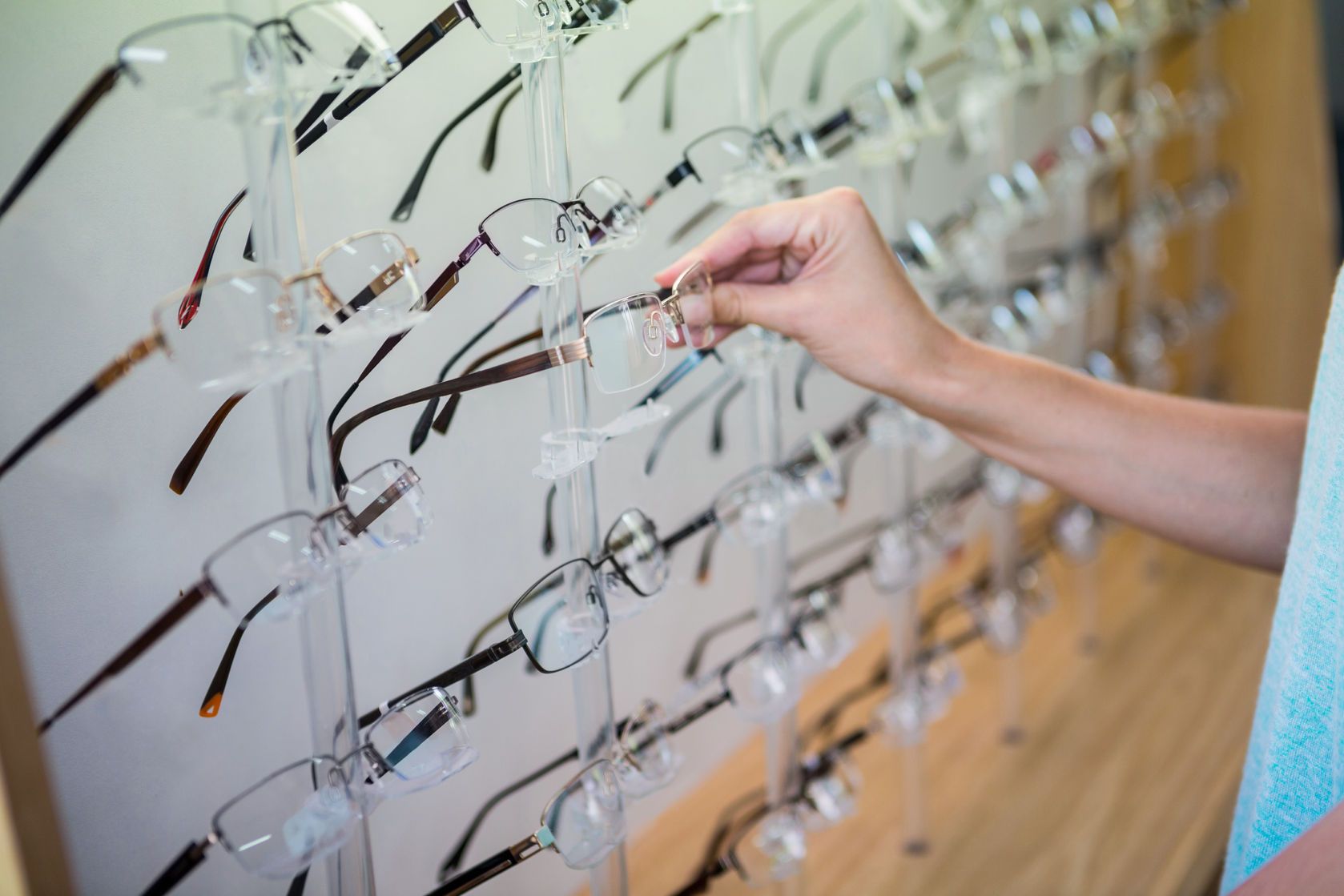 A wall of eyeglass frames at the practice